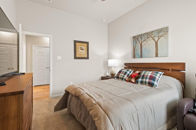 503 Highland Thicket Dr, Conroe, TX 77316 - bedroom featuring light carpet and baseboards