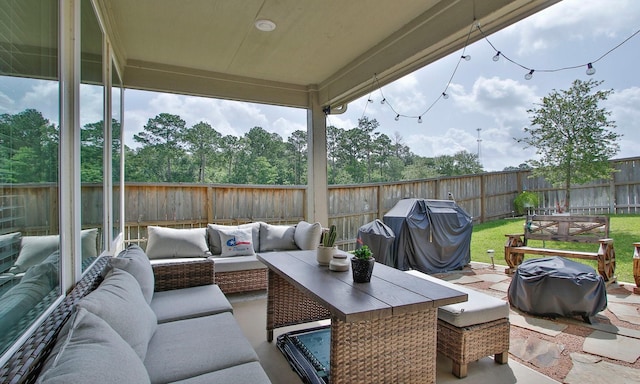 503 Highland Thicket Dr, Conroe, TX 77316 - fenced backyard with grilling area, an outdoor hangout area, and a patio