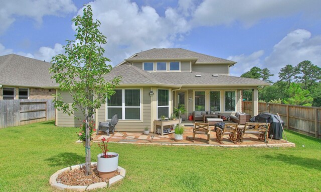 503 Highland Thicket Dr, Conroe, TX 77316 - rear view of house with an outdoor hangout area, a fenced backyard, a patio, and a shingled roof