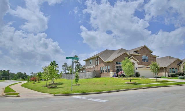 503 Highland Thicket Dr, Conroe, TX 77316 - view of front of home with brick siding, a garage, and concrete driveway