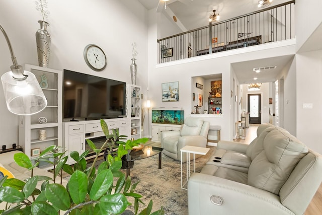 503 Highland Thicket Dr, Conroe, TX 77316 - living room with a towering ceiling and wood finished floors