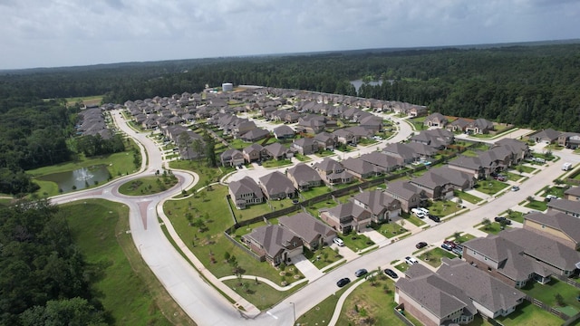 503 Highland Thicket Dr, Conroe, TX 77316 - aerial view of property's location featuring nearby suburban area and a nearby body of water