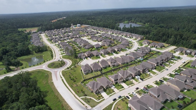 503 Highland Thicket Dr, Conroe, TX 77316 - aerial view of property and surrounding area featuring a nearby body of water and nearby suburban area