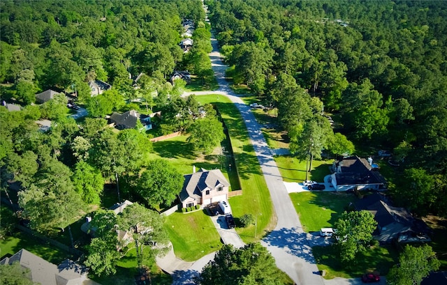 59 Beaconsfield Dr, Magnolia, TX 77355 - aerial view of a heavily wooded area