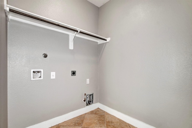 59 Beaconsfield Dr, Magnolia, TX 77355 - laundry area featuring gas dryer hookup, hookup for an electric dryer, washer hookup, and light tile patterned floors