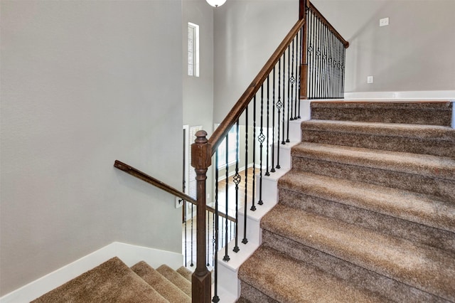 59 Beaconsfield Dr, Magnolia, TX 77355 - stairway featuring carpet and baseboards