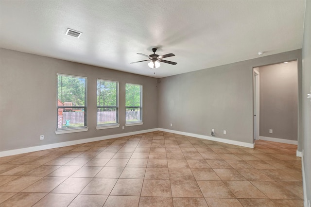 59 Beaconsfield Dr, Magnolia, TX 77355 - unfurnished room with a ceiling fan and light tile patterned floors