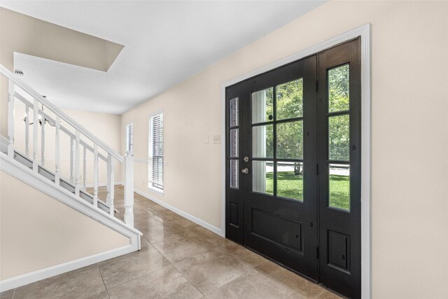 5 Cat Feet Ct, Spring, TX 77381 - foyer featuring baseboards and stairway