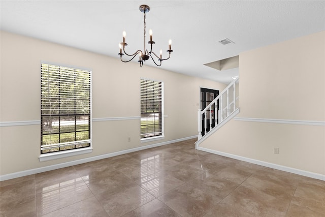 5 Cat Feet Ct, Spring, TX 77381 - tiled spare room featuring a chandelier and stairs