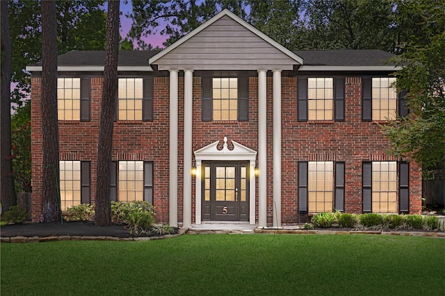 5 Cat Feet Ct, Spring, TX 77381 - neoclassical / greek revival house with a front lawn and brick siding