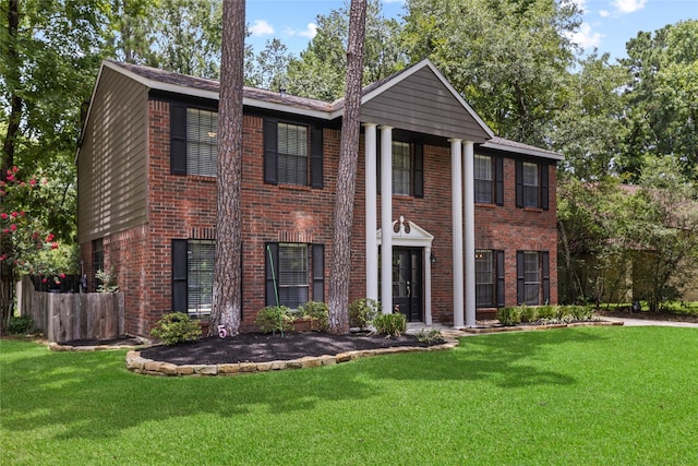 5 Cat Feet Ct, Spring, TX 77381 - greek revival inspired property with brick siding