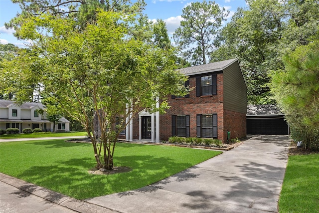 5 Cat Feet Ct, Spring, TX 77381 - view of front of property with brick siding and a front lawn