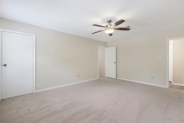 5 Cat Feet Ct, Spring, TX 77381 - unfurnished bedroom with carpet and a ceiling fan