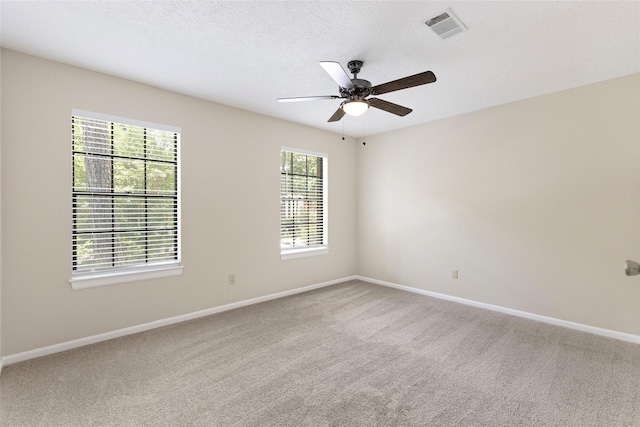 5 Cat Feet Ct, Spring, TX 77381 - carpeted spare room with baseboards and ceiling fan