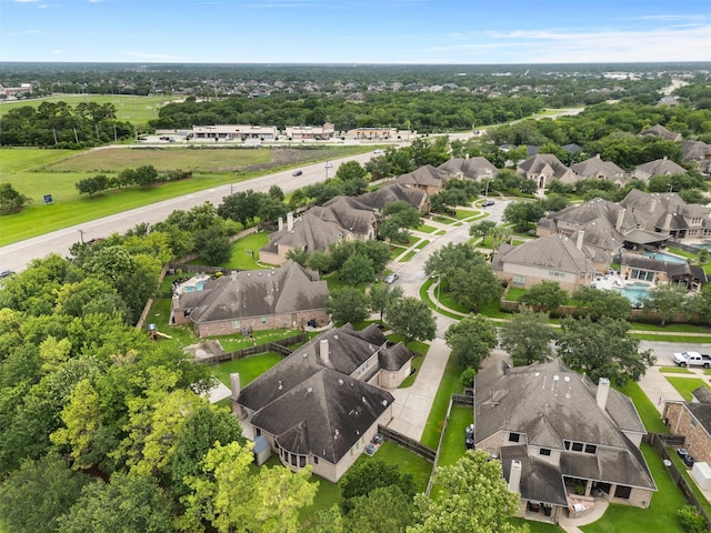 100 Anderson Ranch Ln, Friendswood, TX 77546 - aerial view of residential area featuring a tree filled landscape