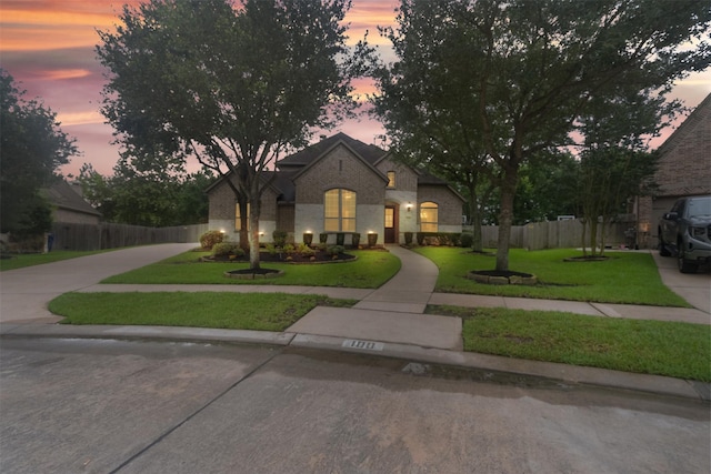 100 Anderson Ranch Ln, Friendswood, TX 77546 - french country inspired facade with brick siding