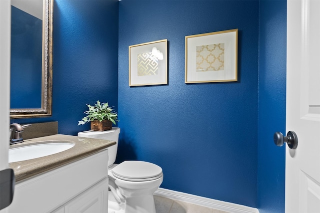 100 Anderson Ranch Ln, Friendswood, TX 77546 - bathroom with vanity, tile patterned flooring, and a textured wall