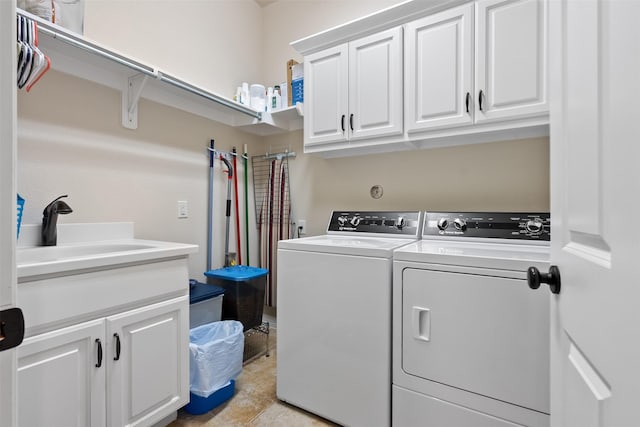 100 Anderson Ranch Ln, Friendswood, TX 77546 - laundry room with washer and clothes dryer and cabinet space