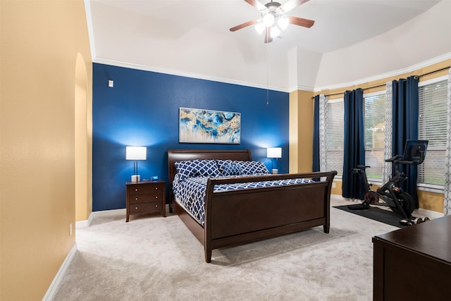 100 Anderson Ranch Ln, Friendswood, TX 77546 - bedroom featuring arched walkways, carpet floors, and a ceiling fan