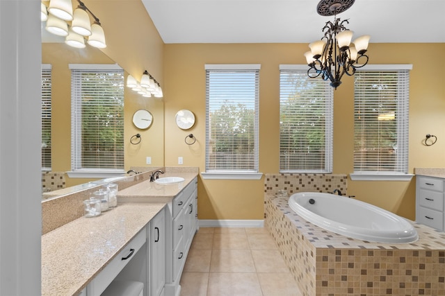 100 Anderson Ranch Ln, Friendswood, TX 77546 - bathroom with a chandelier, vanity, a bath, and tile patterned flooring
