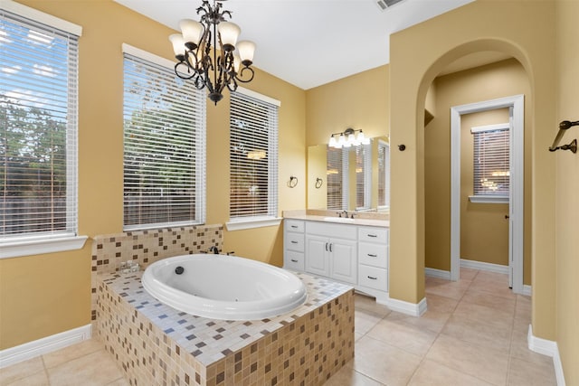 100 Anderson Ranch Ln, Friendswood, TX 77546 - full bath featuring vanity, a bath, a chandelier, and tile patterned flooring