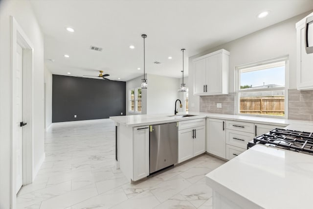 10219 Carmencita Way, Houston, TX 77075 - kitchen featuring dishwasher, ceiling fan, light marble finish flooring, a peninsula, and recessed lighting