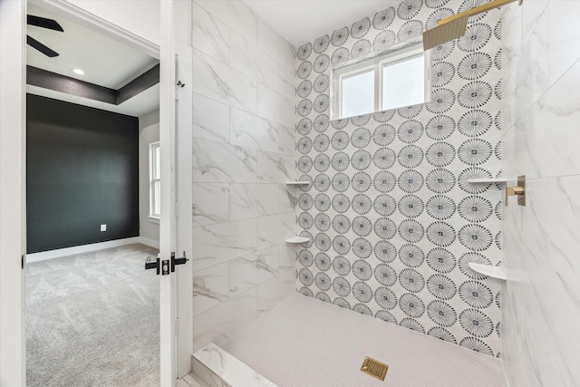 10219 Carmencita Way, Houston, TX 77075 - bathroom featuring a tile shower and baseboards