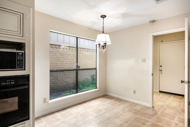 8020 Oakwood Forest Dr, Houston, TX 77040 - unfurnished dining area featuring plenty of natural light and light tile patterned floors