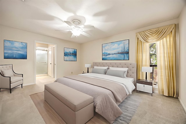 8020 Oakwood Forest Dr, Houston, TX 77040 - bedroom featuring carpet, ceiling fan, and connected bathroom
