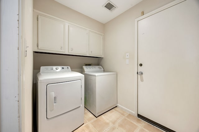 8020 Oakwood Forest Dr, Houston, TX 77040 - laundry room featuring cabinet space and washer and dryer