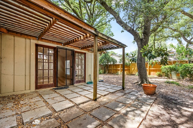 8020 Oakwood Forest Dr, Houston, TX 77040 - fenced backyard featuring a pergola and a patio area