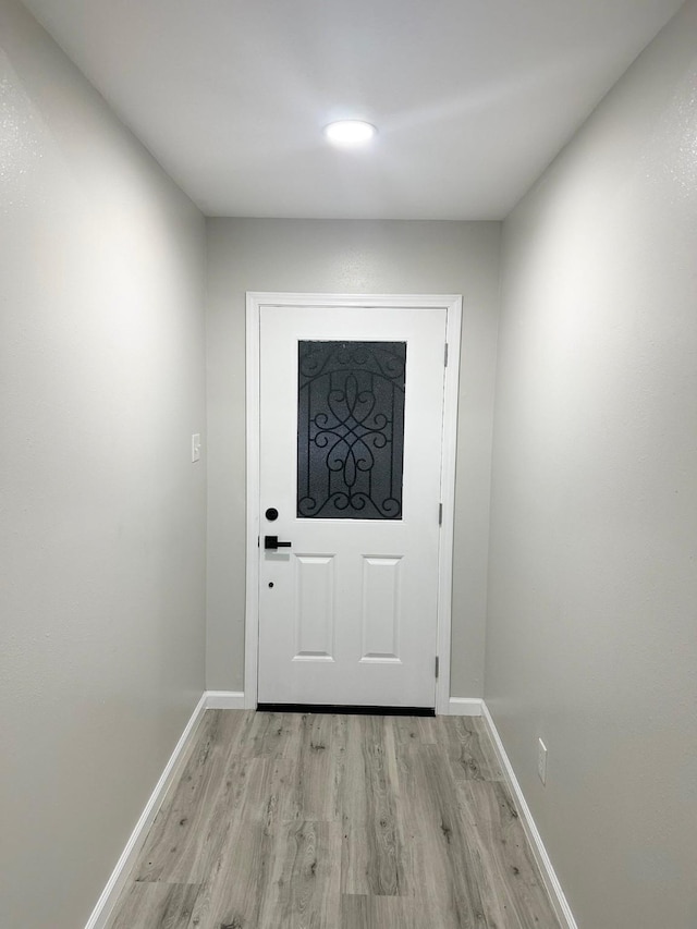 18468 Misty Wood Ln, Porter, TX 77365 - doorway featuring light wood finished floors