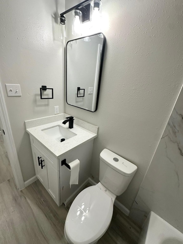18468 Misty Wood Ln, Porter, TX 77365 - bathroom featuring vanity and wood finished floors