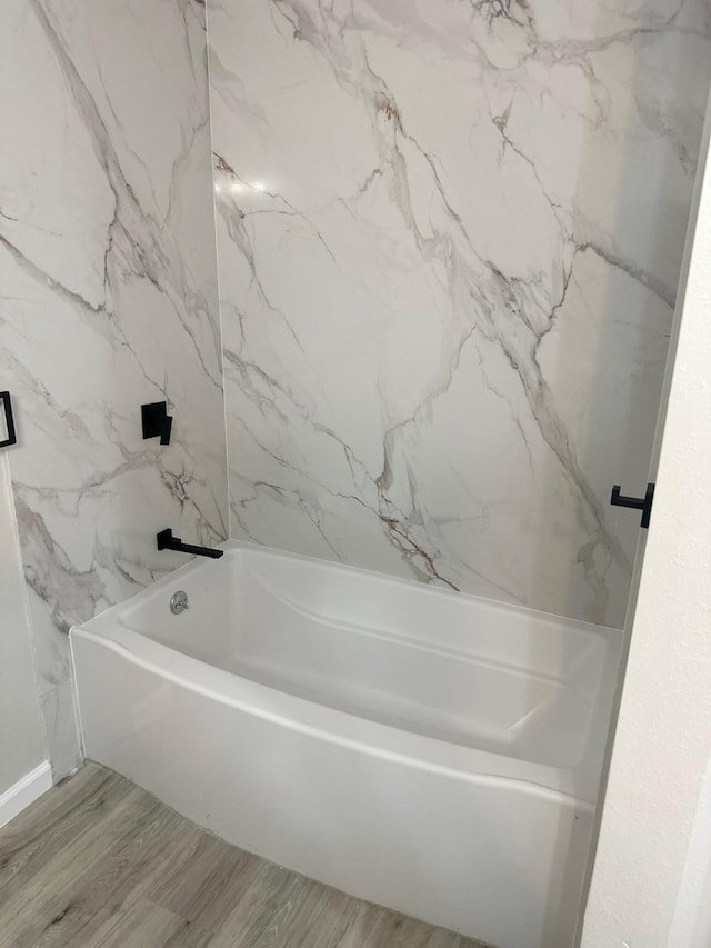 18468 Misty Wood Ln, Porter, TX 77365 - full bathroom featuring wood finished floors and bathing tub / shower combination