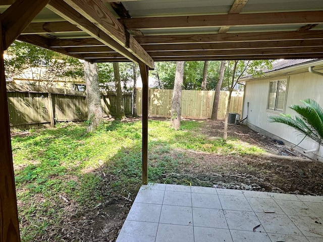 18468 Misty Wood Ln, Porter, TX 77365 - fenced backyard with a patio area