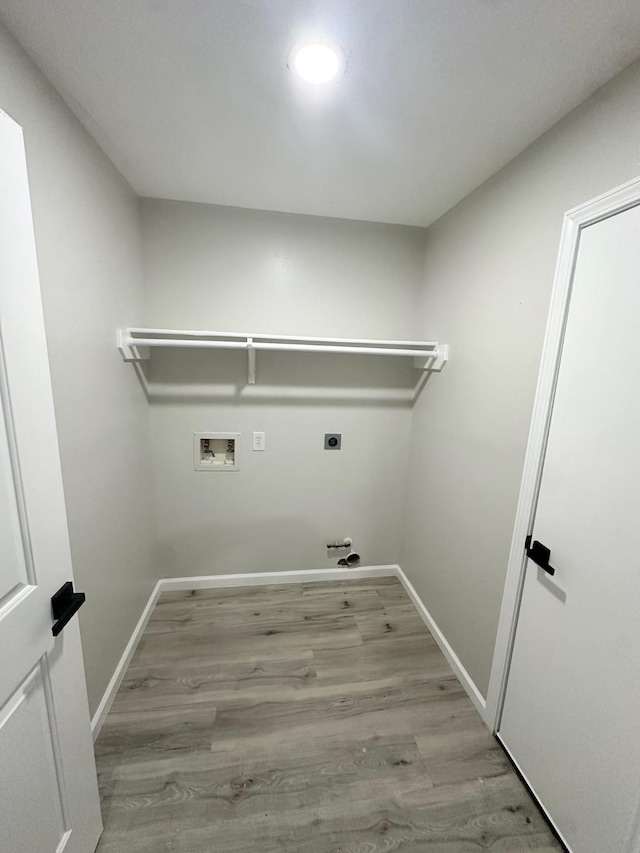 18468 Misty Wood Ln, Porter, TX 77365 - laundry area featuring wood finished floors, washer hookup, hookup for an electric dryer, and recessed lighting
