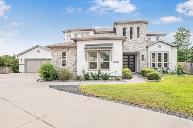 34207 Mill Creek Ct, Pinehurst, TX 77362 - view of front facade featuring stucco siding, stone siding, concrete driveway, and a garage