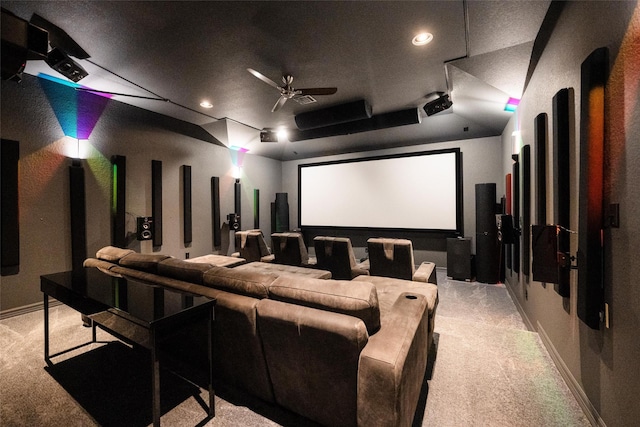 34207 Mill Creek Ct, Pinehurst, TX 77362 - cinema room with light colored carpet, ceiling fan, recessed lighting, and a tray ceiling