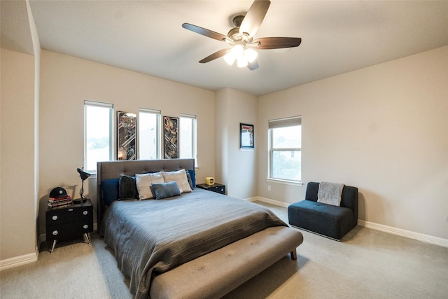 34207 Mill Creek Ct, Pinehurst, TX 77362 - bedroom with light colored carpet and ceiling fan