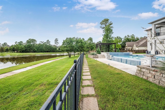 34207 Mill Creek Ct, Pinehurst, TX 77362 - view of grassy yard with a pergola and a water view