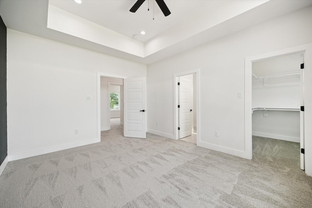 8614 Viera Ln, Houston, TX 77075 - unfurnished bedroom with carpet, a walk in closet, a ceiling fan, a closet, and recessed lighting