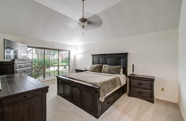 3411 Deeds Rd, Houston, TX 77084 - bedroom featuring light colored carpet, a textured ceiling, and a ceiling fan