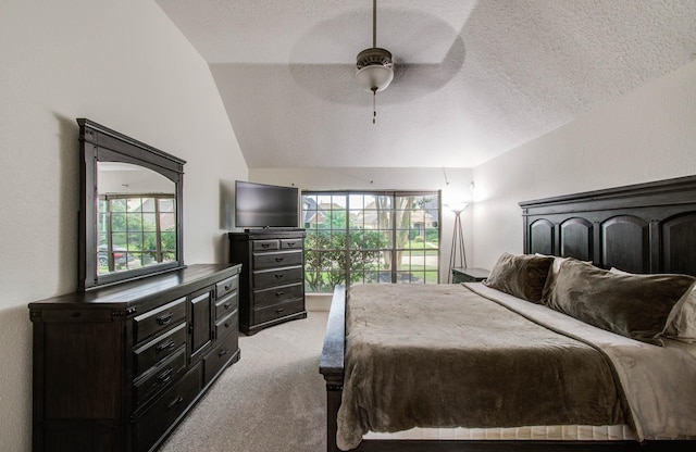 3411 Deeds Rd, Houston, TX 77084 - bedroom with light carpet, vaulted ceiling, a textured ceiling, and ceiling fan