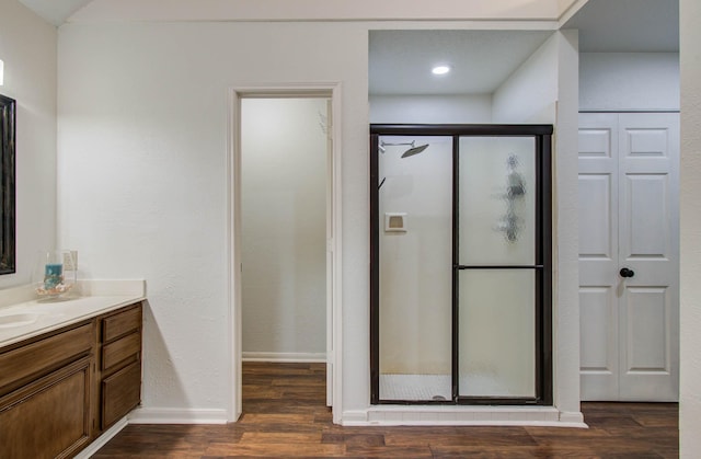 3411 Deeds Rd, Houston, TX 77084 - full bath with vanity, a stall shower, wood finished floors, and a closet