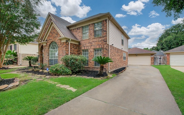 3411 Deeds Rd, Houston, TX 77084 - view of front of property with a front lawn, brick siding, and a garage