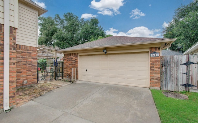 3411 Deeds Rd, Houston, TX 77084 - garage featuring a gate and driveway