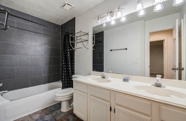3411 Deeds Rd, Houston, TX 77084 - bathroom featuring double vanity and shower / tub combo with curtain