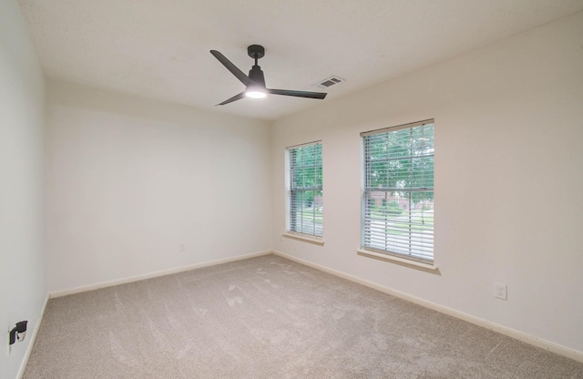 3411 Deeds Rd, Houston, TX 77084 - carpeted spare room featuring a ceiling fan and baseboards