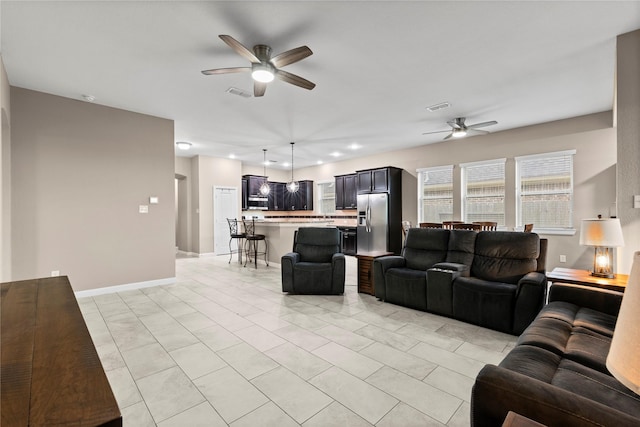19647 Travis Cannon Ln, Richmond, TX 77407 - living room with a ceiling fan and recessed lighting