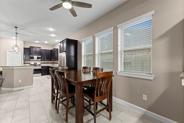 19647 Travis Cannon Ln, Richmond, TX 77407 - dining room featuring ceiling fan, light tile patterned floors, and recessed lighting